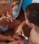 Boy Caught Giving Yogurt to His Little Brother