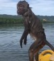 Wild monkey climbs aboard kayaker\'s boat