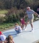 Man Thinks on His Feet to Avoid Collision on Slide