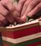 Dad Tries to Wrap Christmas Present