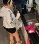 Woman Catches Mouse in Kitchen and Releases It