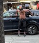 Wild Man Punching and Climbing on Cars Gets Arrested