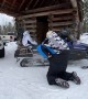 Dog Gets Ready to Ride Piggyback on Snow Mobile