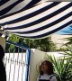Mom Accidently Splashes Daughter While Cleaning Awning