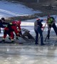 Firefighters rescue elk from icy pond