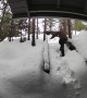 UPS Driver Trudges Through Snow-Covered Stairs to Deliver Package