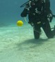 Cracking an Egg Open 12 Meters Underwater