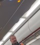 Airplane Passengers Cheer For Police During Arrest