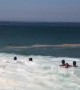 Large Waves Wash Over Beachgoers in Brazil