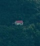 Mysterious Building Appears Isolated on Mountainside