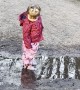 Girl Finds Joy in a Mud Puddle