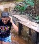 Girl Takes an Unexpected Dip and Laughs It Off