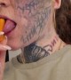 Woman Grabs Carrot With Her Split Tongue