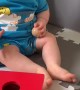 Baby unknowingly pulls off epic trick shot