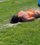 Woman Bellyflops Off Slip-and-Slide