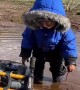 Son Plays In The Mud