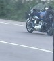 Motorcycle Rider Reclines Comfortably on the Highway