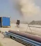 Dust Devil Sweeps Through Worksite