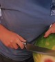 Slicing A Melon With A Melon-Slicer