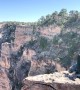 Tourists Hop Over Railing at Grand Canyon