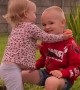 Young Siblings Show Affection Before Shoving