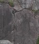 Mountain Biker Rides Vertical Rock Wall