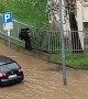 Pedestrian Stays Dry During a Flood