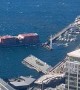 Cargo ship breaks free, crashes into Bell Harbor pier 