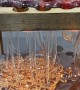 Dripping Molten Glass Over a Wooden Board With Holes