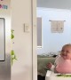 Baby girl\'s reaction to her parents hugging is too adorable 