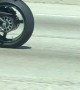 Motorcyclist Rides Sidesaddle on the Freeway