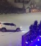 Car slides uncontrollably on the snow  in British Colombia 