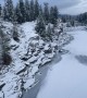 Throwing Snow Onto Icy River