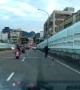 Scooter Man Slips In Traffic
