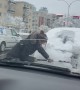 Cleaning Snow Off Stranger's Back Window