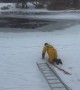 Firefighter rescues dog from icy lake
