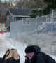 Portlanders Slide Down Icy Drive Way to Protect Their Groceries