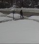 Man Slides Down Icy Driveway and Falls