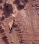 Riding Down A Steep Cliff Face
