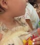 Daughter Grabs Mom's Hand for Comfort