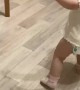 Dizzy Baby Bounces Off Cabinet