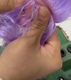 Doll Gets Purple Hair Transplant