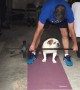 Bulldog Lifts Weights With Owner