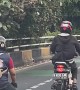 Guy Rides Mini Motorbike