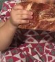Girl Sneakily Enjoys Meat From the Freezer