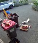 Kid Takes a Fall in a Rubbish Bin