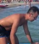 Guy Struggles to Balance on Paddleboard