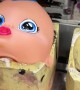 Manufacturer Paints Doll Heads