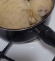 Cat Takes a Nap in Cookware