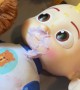 Toddler Tries to Feed Dolls Yogurt
